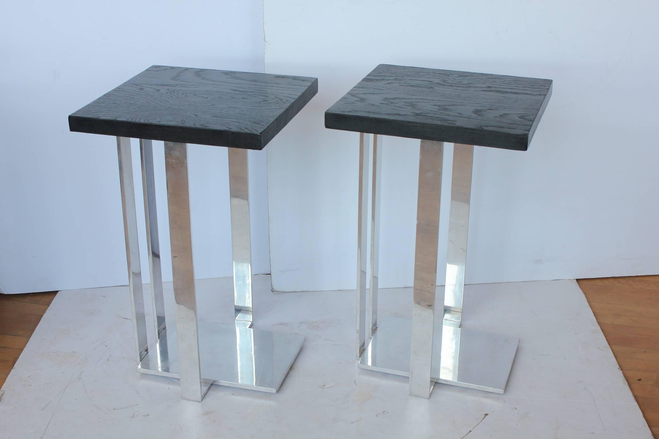 Modern American chrome and ebonized wood side tables.