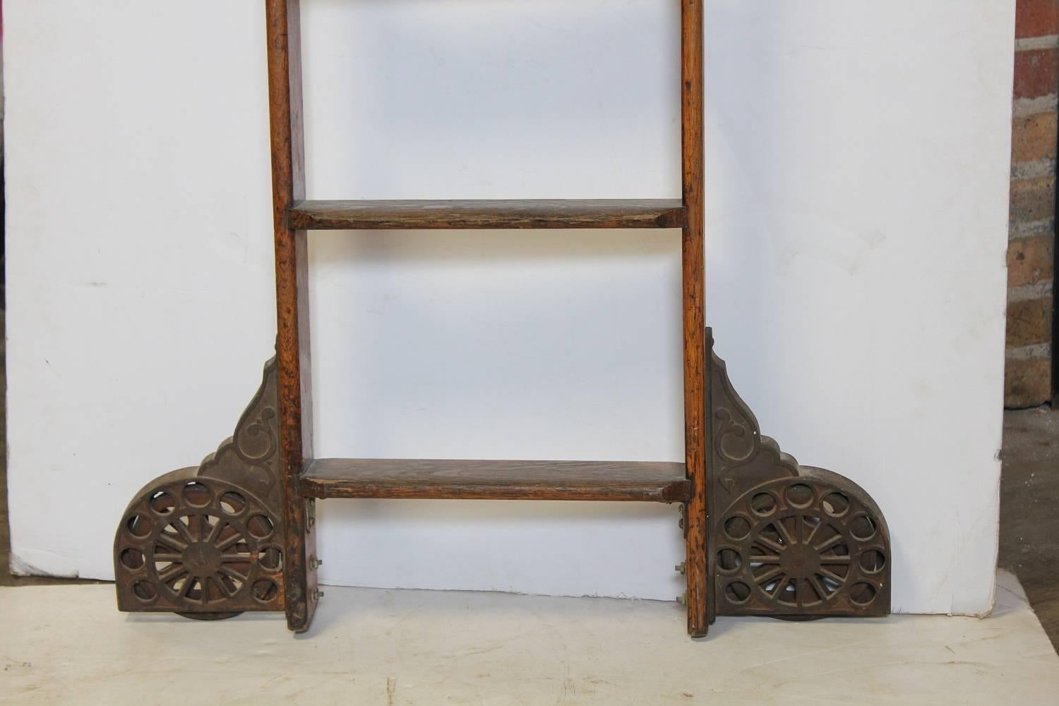 Antique library ladder by the Coburn Trolley Track Mfg Co. Original wheels. Original finish.