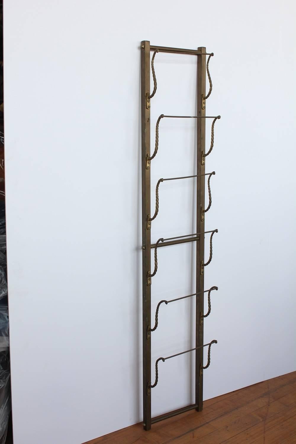Antique hotel magazine wall brass rack or holder.