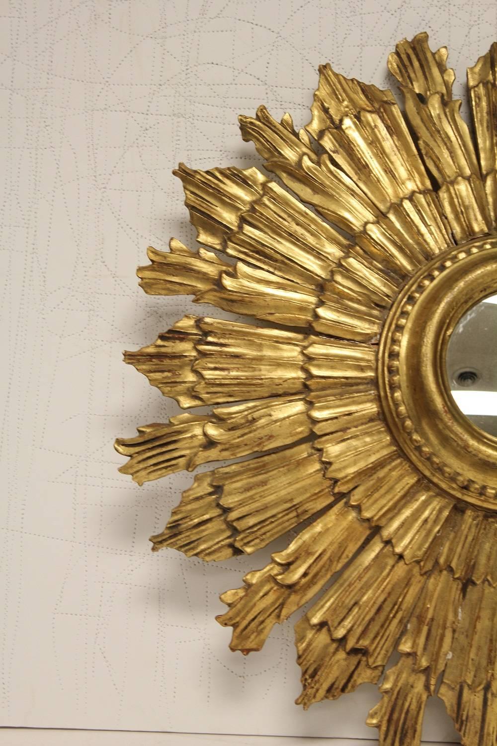Midcentury Italian sunburst convex mirror in gilt wood frame