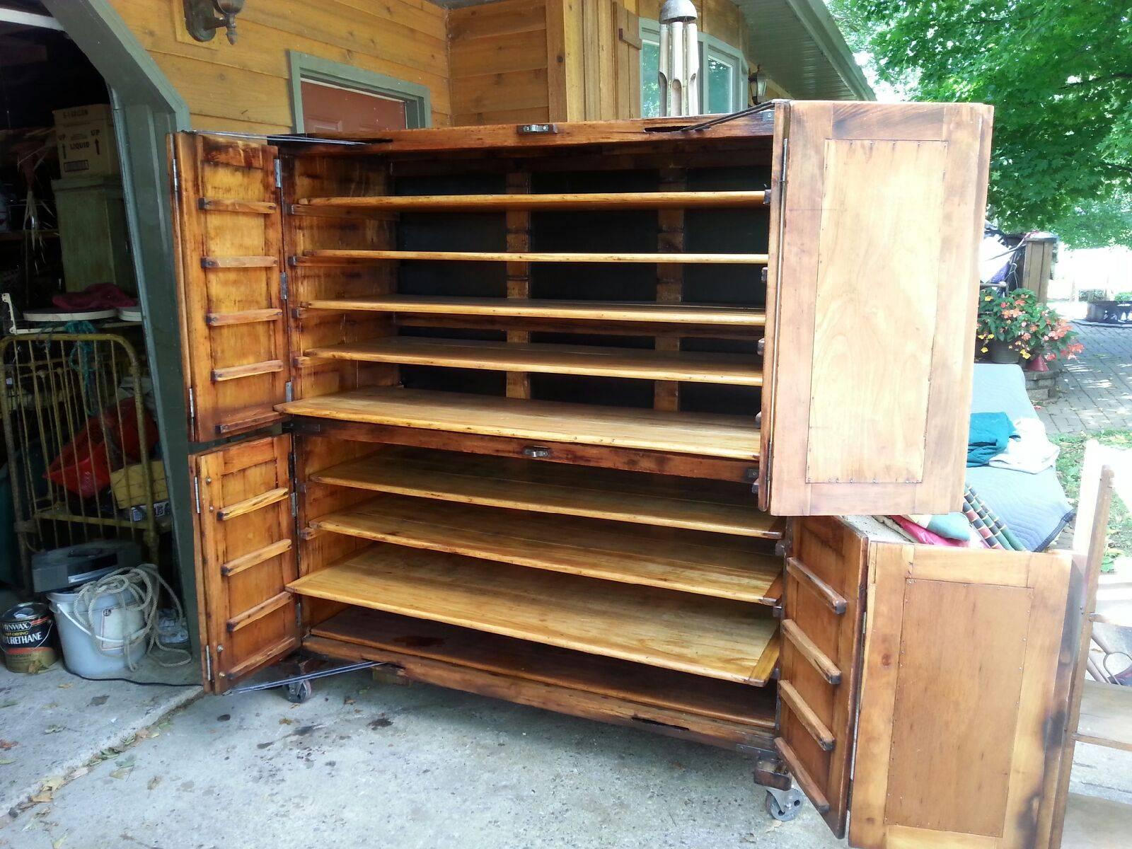 Antique, French bakery cabinet with original hardware. Shelves are moveable.