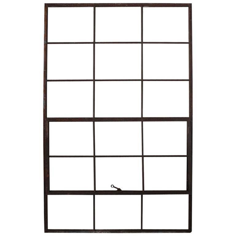 Large antique American industrial metal casement window.