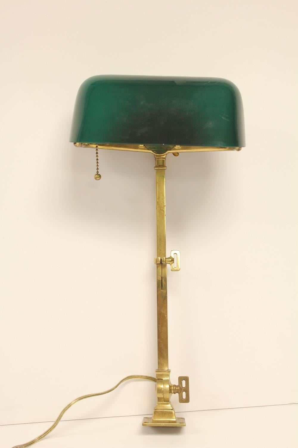 1920s American Emeralite brass adjustable desk lamp by H.G. McFaddin & Co with original glass shade. Triple-jointed.