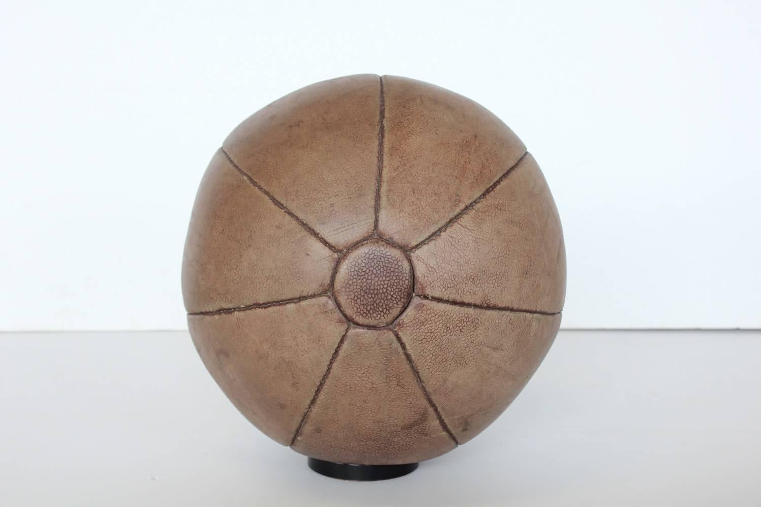 1930s French leather medicine ball.