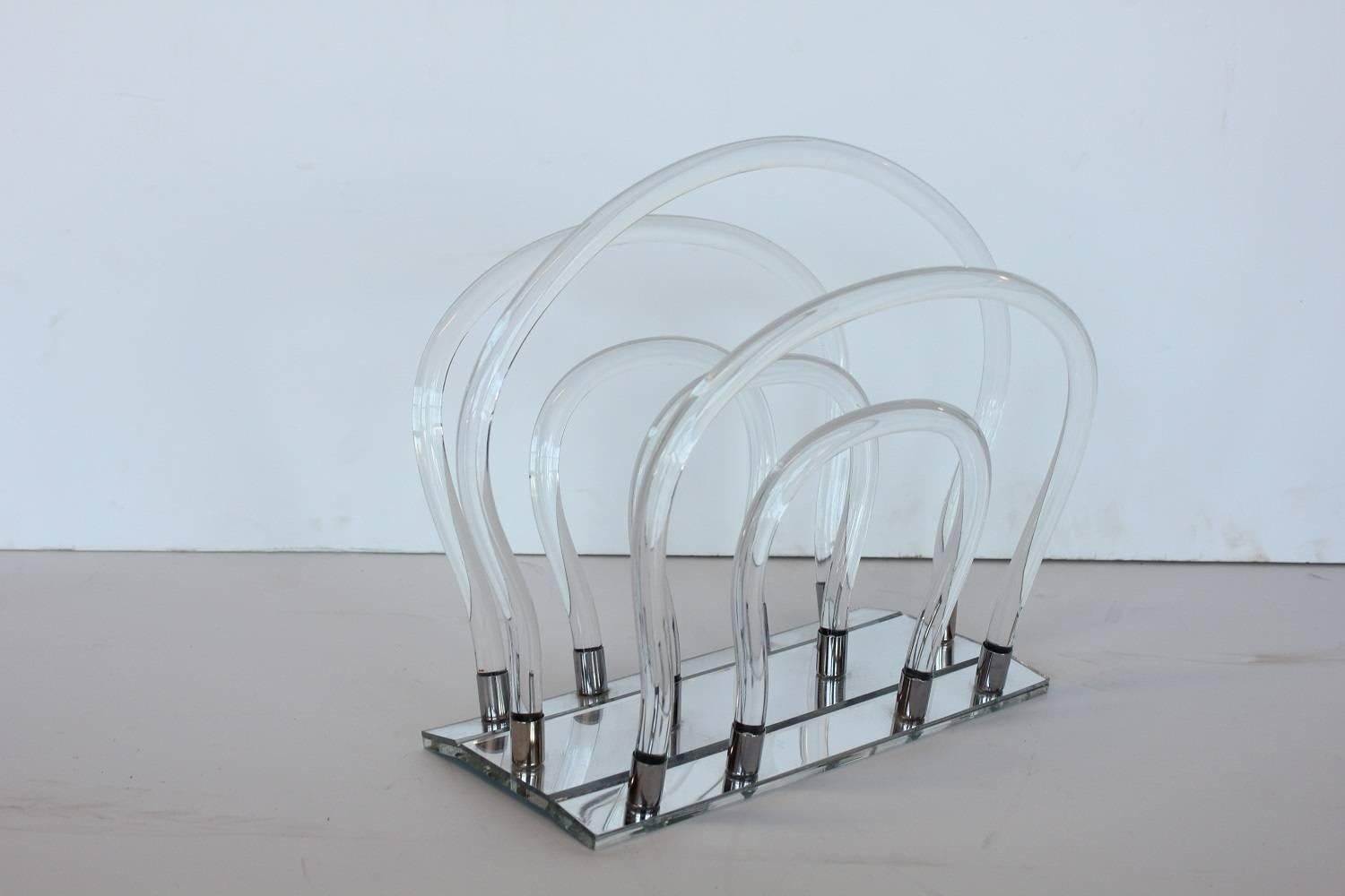 Midcentury Lucite and chrome magazine rack by Dorothy Thorpe.