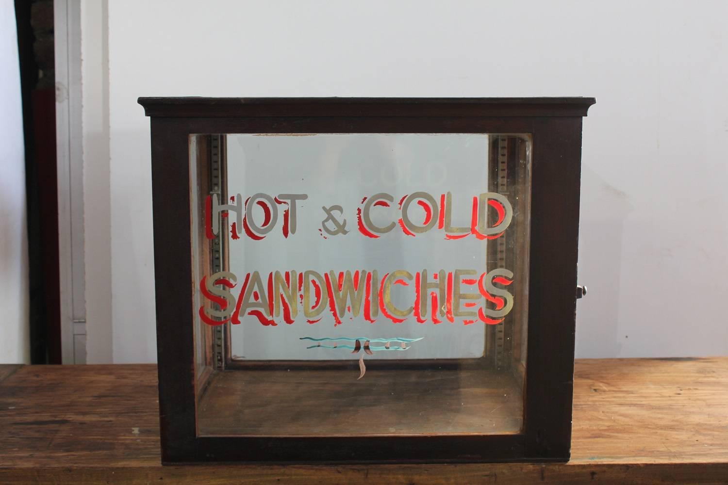 1930s Hot & Cold Sandwiches showcase. Original hand-painted sign.