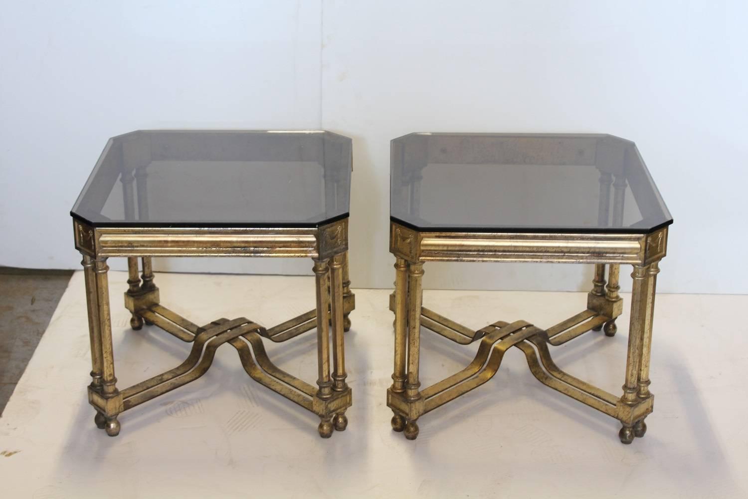 1930s French Maison Jansen style silver leaf accent or side tables with smoked glass tops.