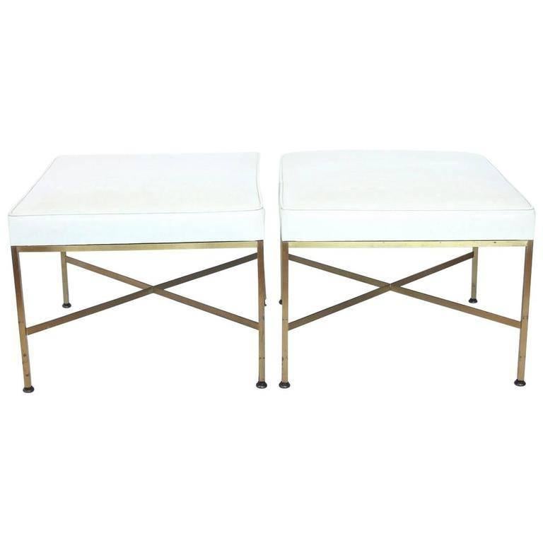 Pair of X-base brass and leather stools or benches by Paul McCobb. New leather upholstery.