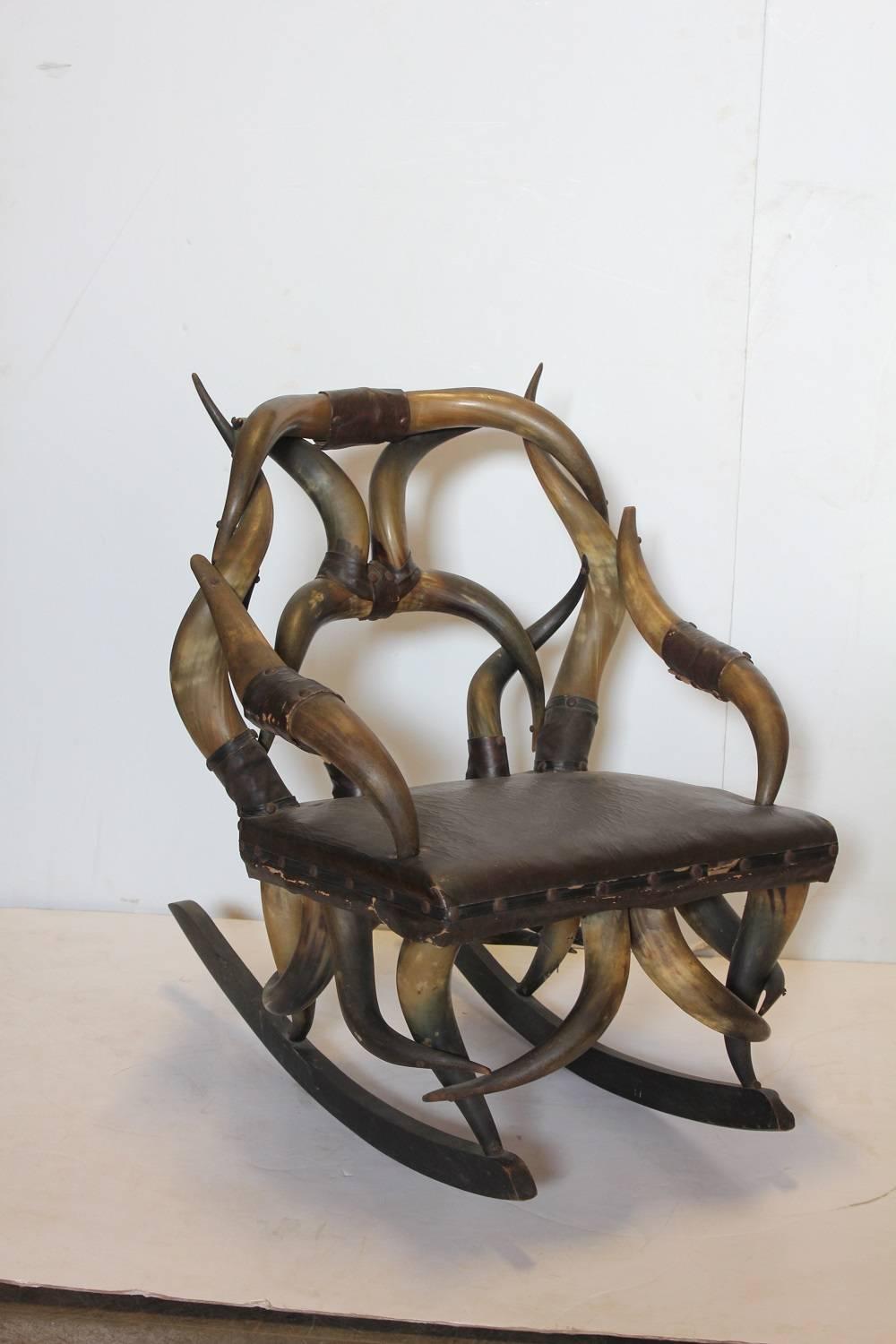 Antique horn and leather rocking chair. Original leather upholstery 