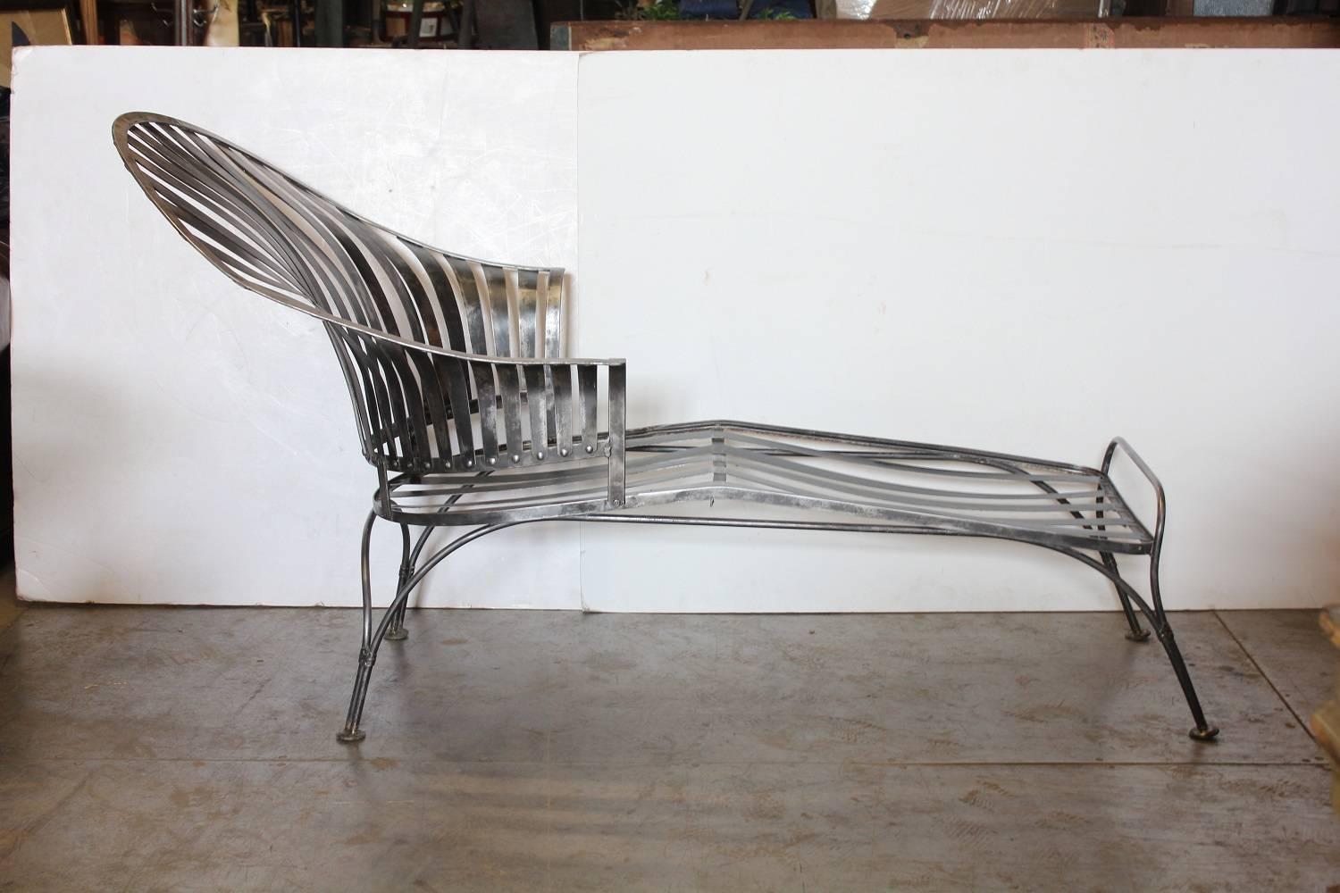 Midcentury metal chaise longue by Woodard. Recently refinished.