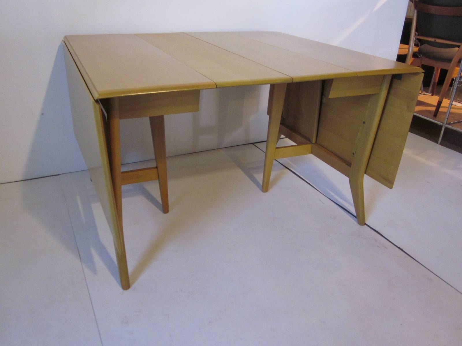 American Heywood Mid-Century Harmonic Drop-Leaf Extension Dining Table