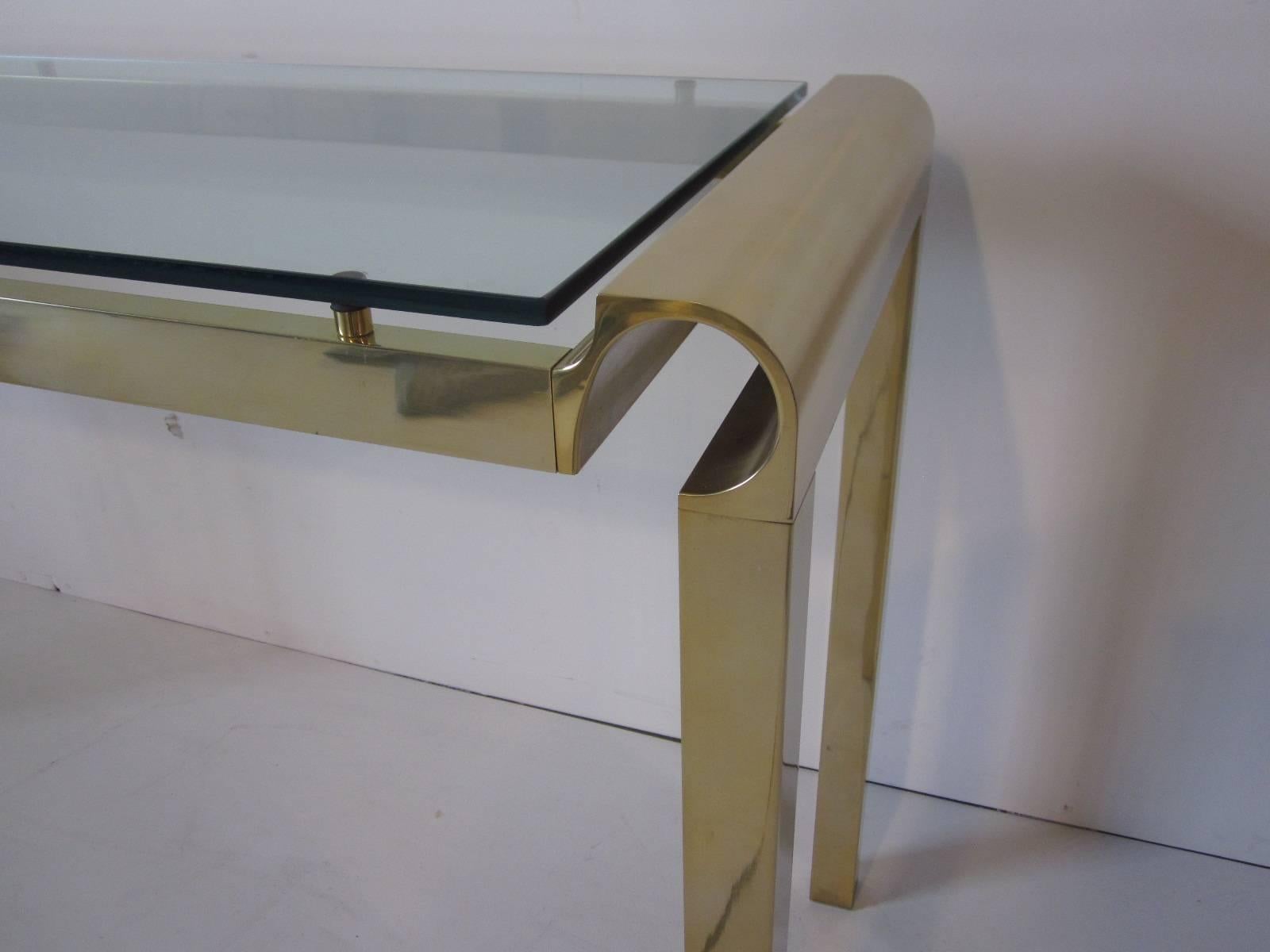 brass and glass console table