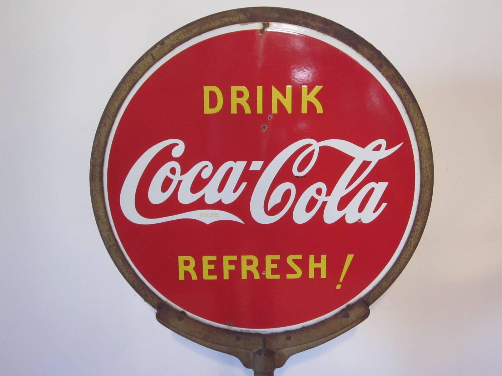coca cola lollipop sign