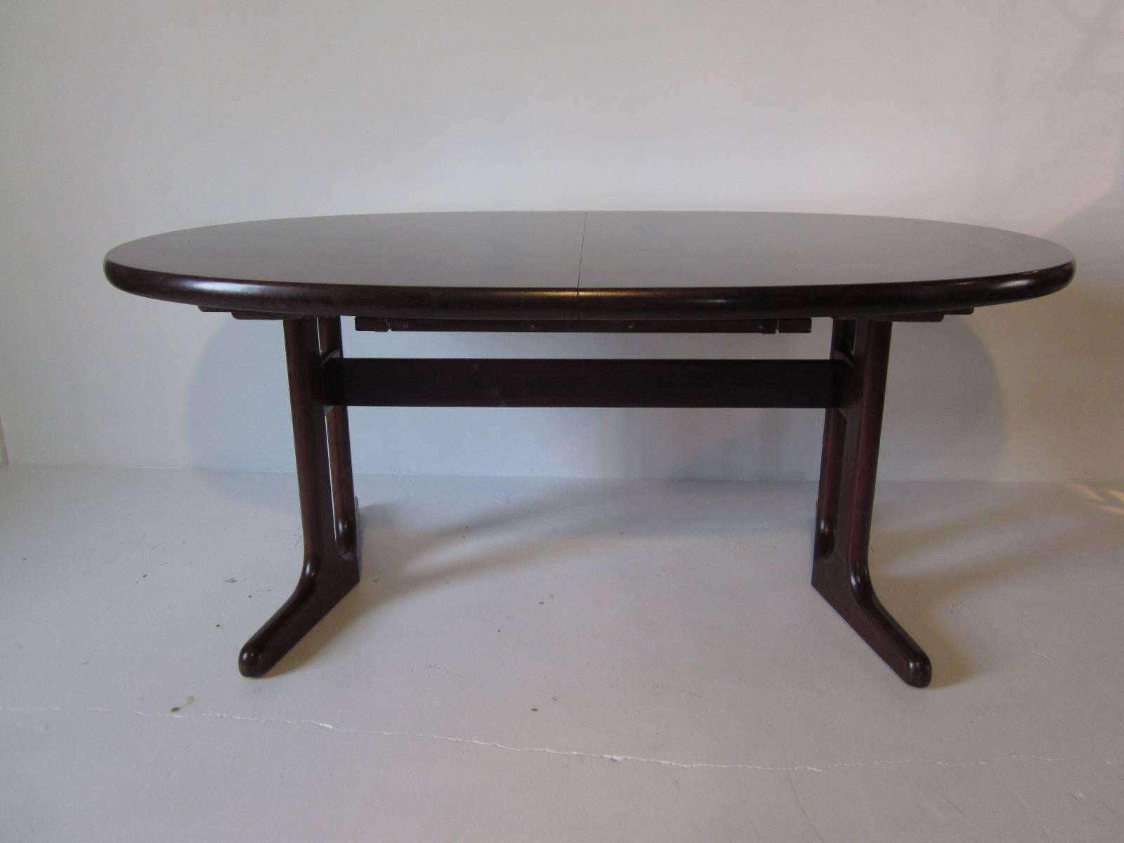 A well made dining table with rolled edge and hidden pop up and fold out 29.50 