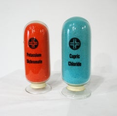 Inverted Medical Pharmaceutical Display Bottles by Merck