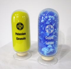 Inverted Medical Pharmaceutical Display Bottles by Merck