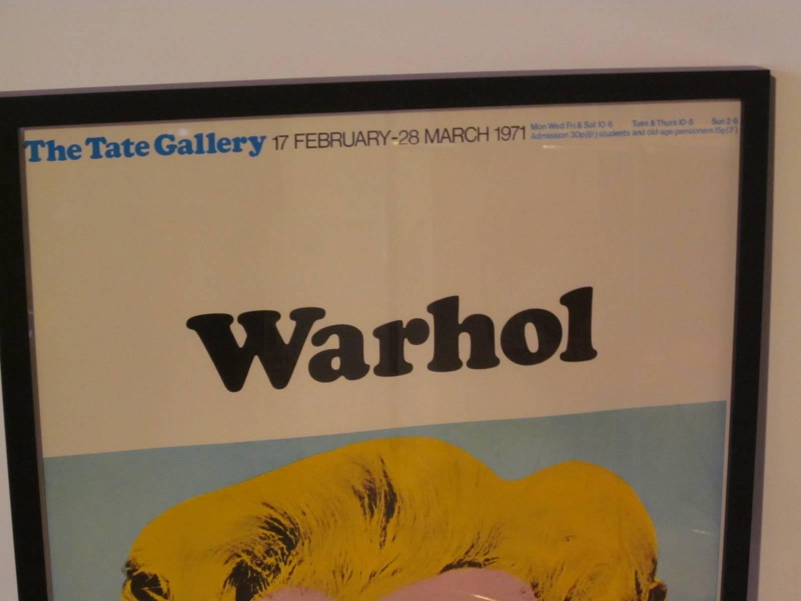 A Marilyn Monroe poster for an Andy Warhol exhibit 17 February thru 28 March 1971 from the Tate Gallery in London. This is a poster from the original period exhibit and is in a satin black frame with UV glass marked to the lower right side and