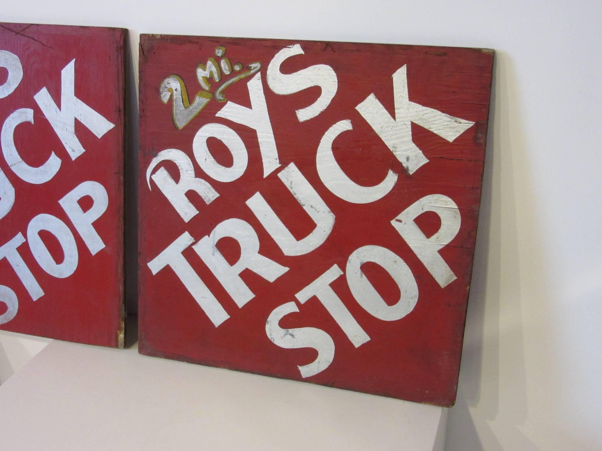A set of three hand-painted Folk Art plywood directional signs with mileage count down in the style of the old Burma Shave signs. Silver roofing paint was used in the lettering with yellow highlights.