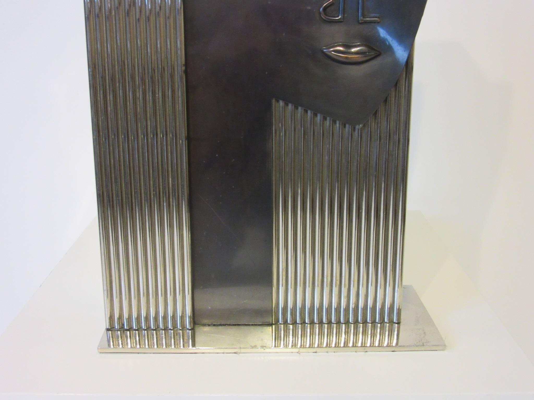 Unknown Modern Styled Chrome Face Vase Sculpture