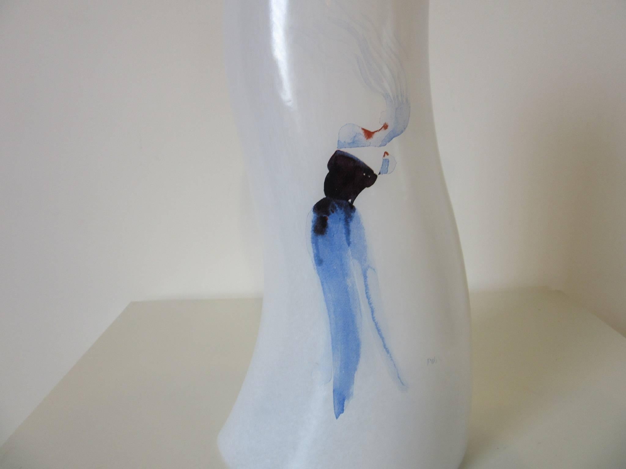 A large handcrafted decorative glass vase titled 