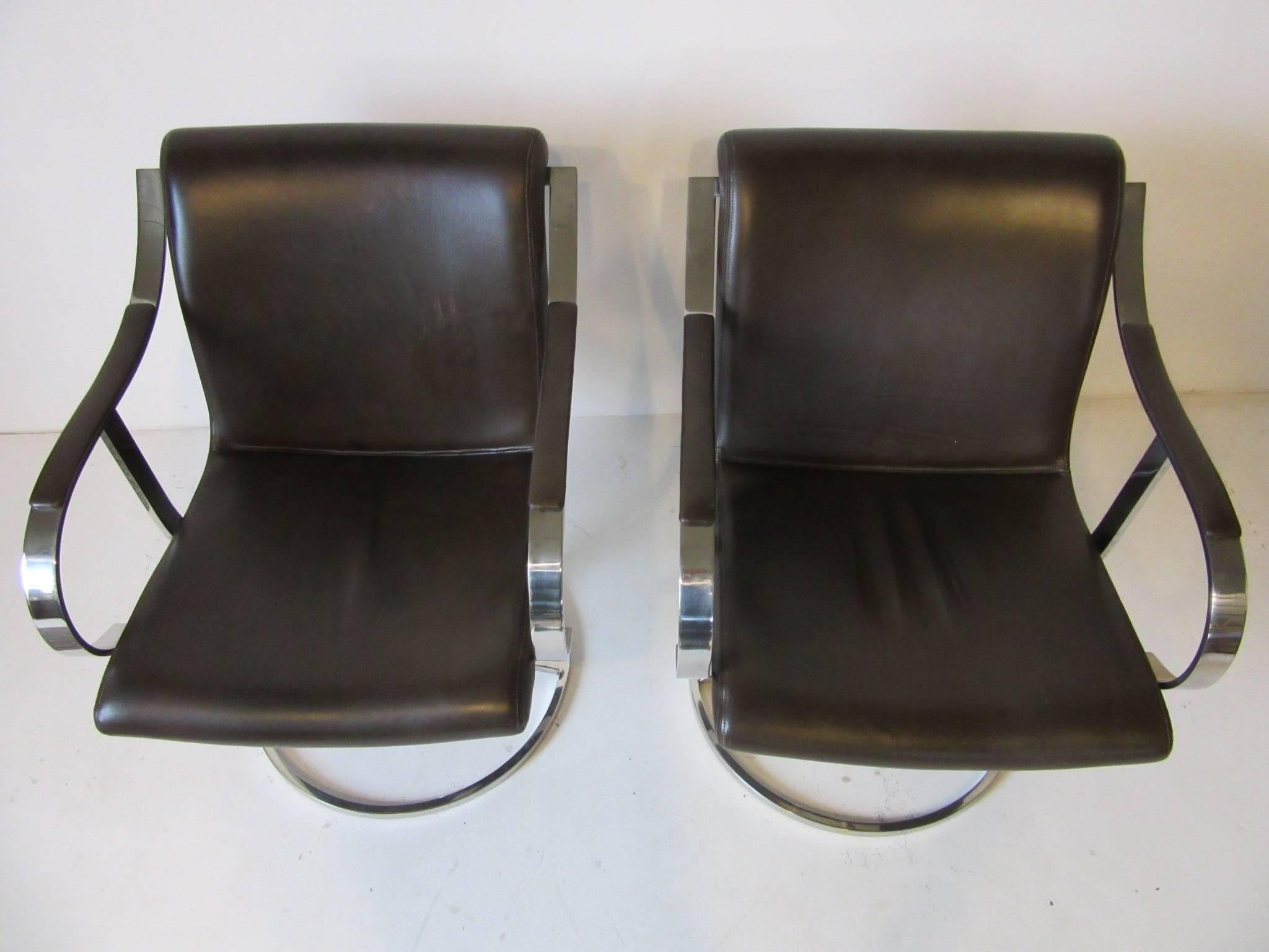 American Steelcase Chrome and Leather Swivelling Lounge Chairs by Gardner Leaver