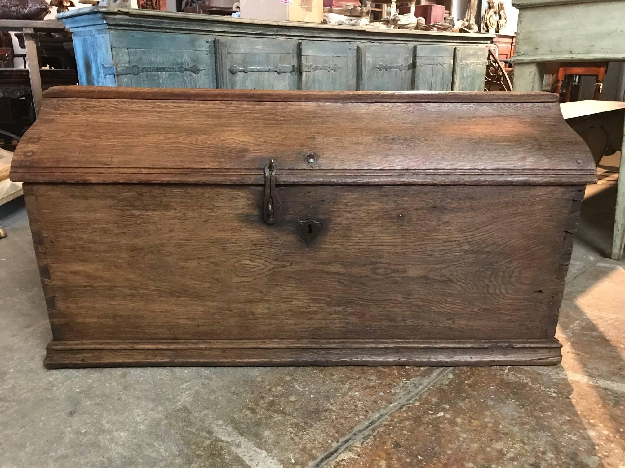 A very handsome later 17th century Coffre - or trunk - from The Netherlands.  Wonderfully constructed with solid boards of beautifully patina'd oak and iron hardware.  Perfect at the foot of a bed or under a picture window.