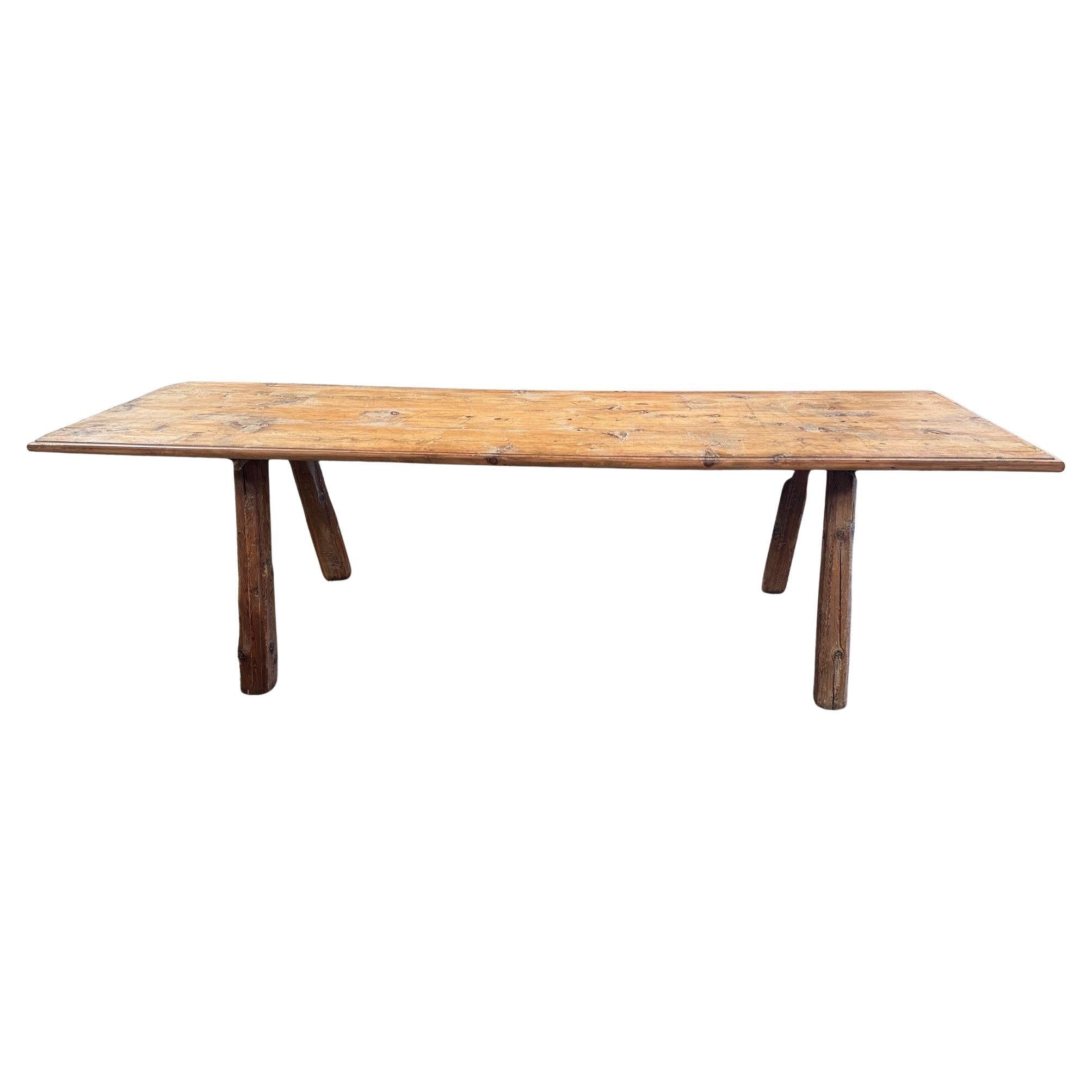 A very handsome 18th century Farm table from the Southwest of France. Soundly constructed from Meleze - a very hard pine, with a wonderful top with a nice edge finish.