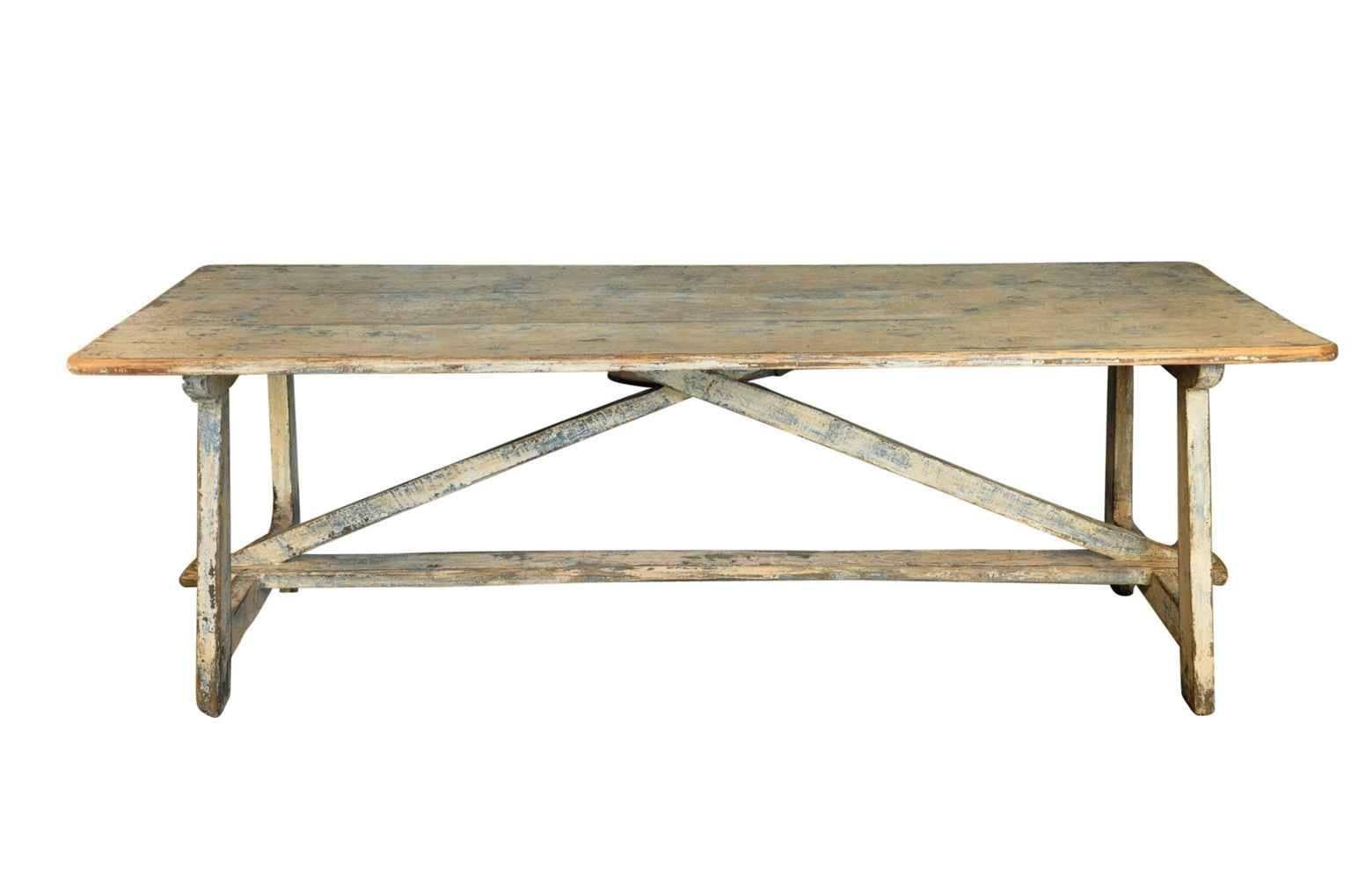 A wonderful mid-19th century farm table - trestle table from the Catalan region of Spain.  Very sound and sturdy construction.  The table has a lovely patina and a rich painted finish is in shades of off-white with under coats a blue.