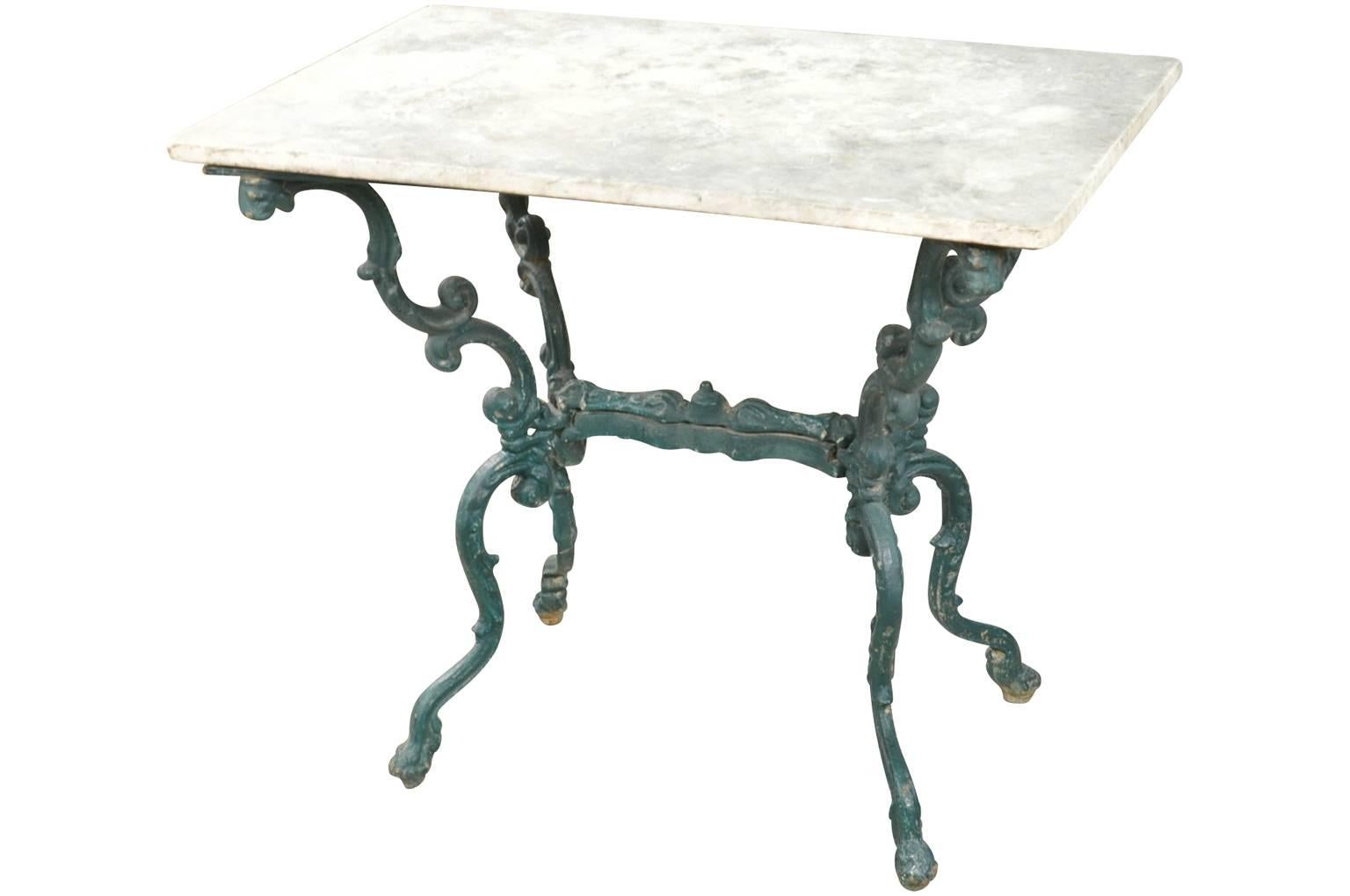 A fabulous 19th century Italian bistro table / garden table in cast iron and its original marble top. Wonderful patina throughout. Perfect occasional table - whether for the interior or the exterior.