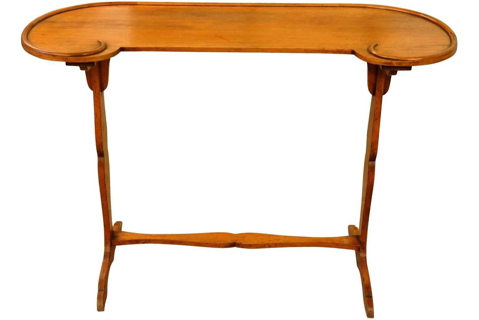 A very lovely French kidney shaped writing table beautifully constructed in fruitwood. Wonderful not only as a writing table, but serves nicely as an end table or console as well.