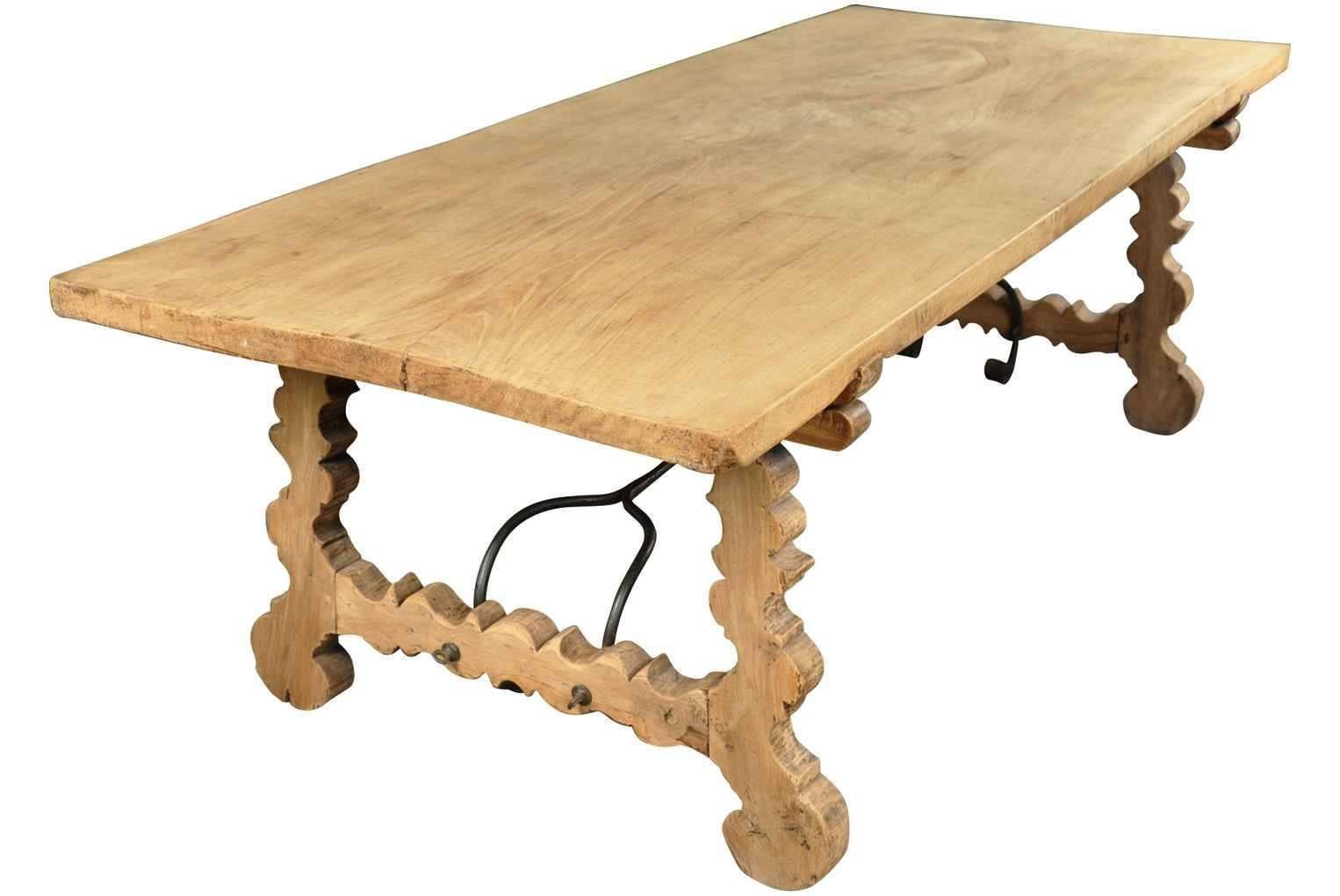 A very striking 19th century Spanish farm table constructed from bleached or washed oak and hand-forged iron stretchers. Wonderful not only as a dining table, but as a large console or writing table as well.