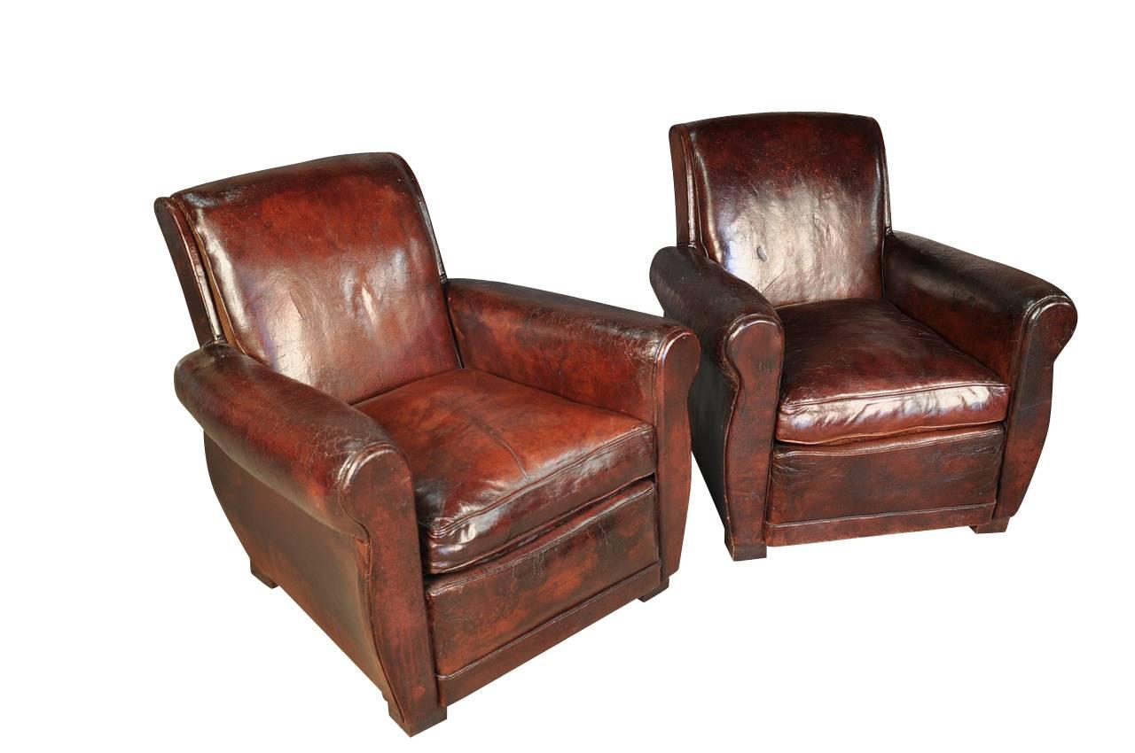 A very handsome pair of French Art Deco leather Club Chairs, circa 1930. Wonderful for any living area, office of library.
