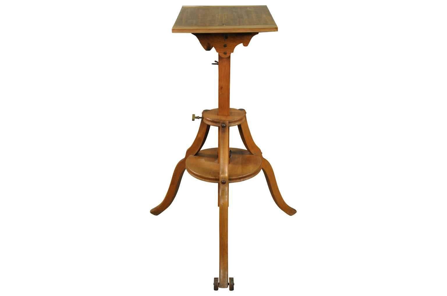 A mechanical selette or sculptor's stand in beechwood, 19th century. The work area raises and lowers. The work area also inclines and declines. The manufacturer's plaque reads - BONNE PRESSE 5, Rue Bayard et 22, Cours - La - Reine paris. The height