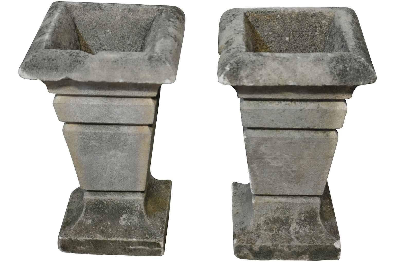 An elegant pair of early 19th century French Art Deco carved stone jardinières. This pair of stone planters will be outstanding whether used indoors or outdoors.