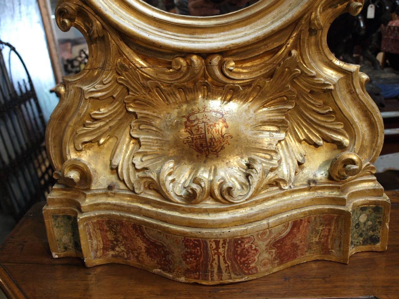 An exceptional 18th century Northern Italian Altar frame, now as a mirror. Magnificently constructed, water gilded and polychromed Florentine detail to base. This mirror serves beautifully as a mantel piece or a powder room mirror.