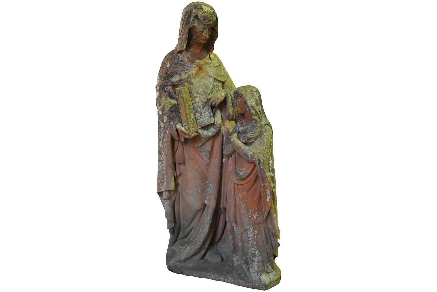 A very beautiful 19th century terracotta statue of a woman and young girl from Northern Italy. Beautifully molded with fine features. A lovely piece for the garden or an interior.
