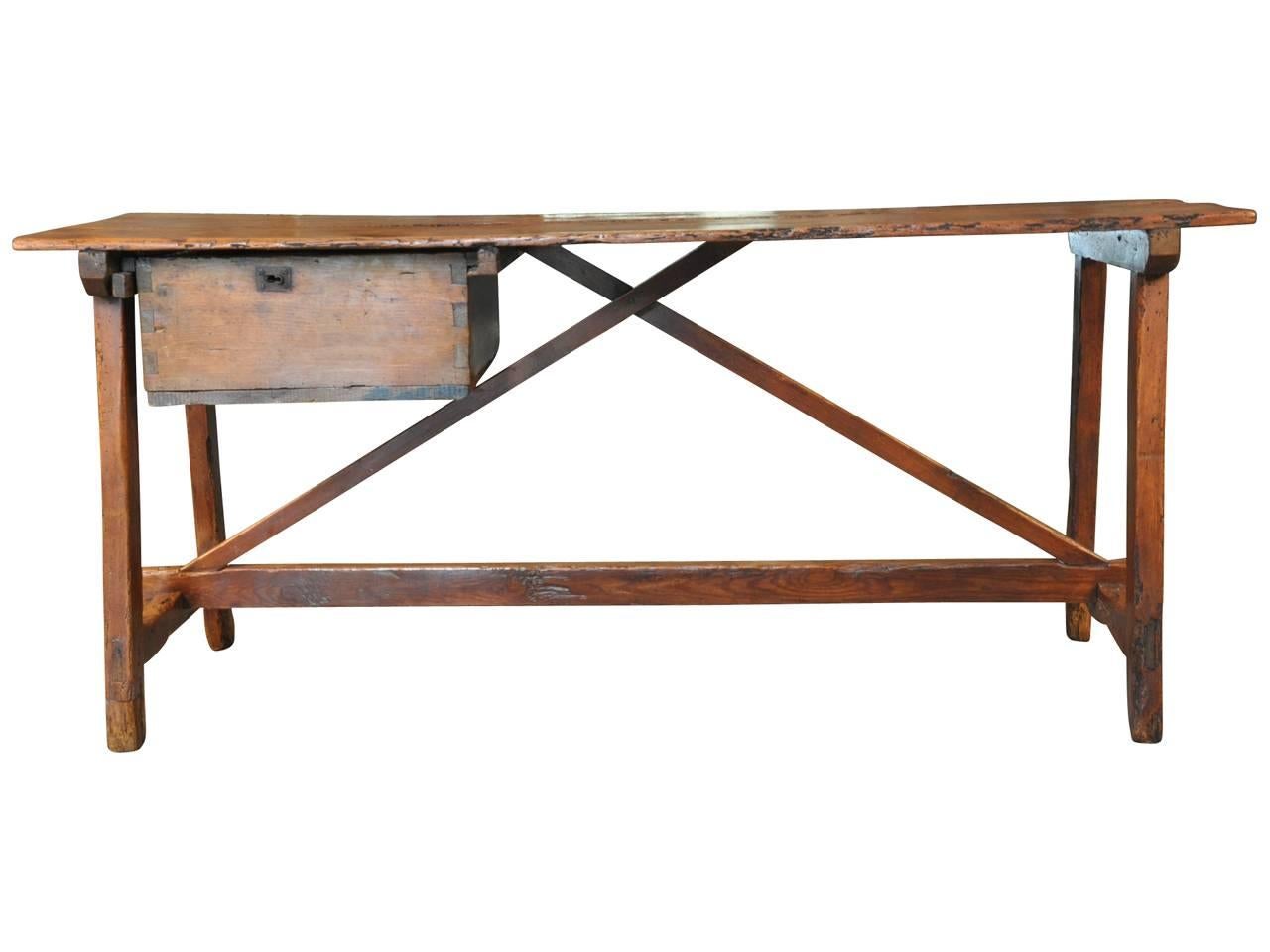A very handsome 19th century work table - console from the Catalan region of Spain. Handsomely constructed in richly stained pinewood - terrific patina. Great as a serving piece, sofa table or console.