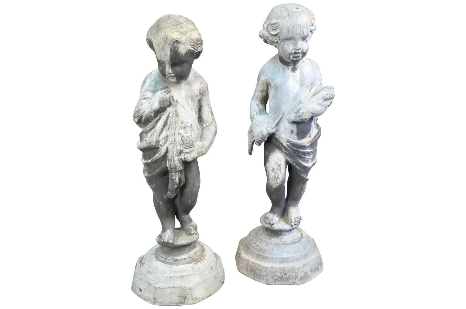An outstanding complete set of the four seasons. Charming lead statues raised on sound bases. A fabulous addition to any garden or interior.