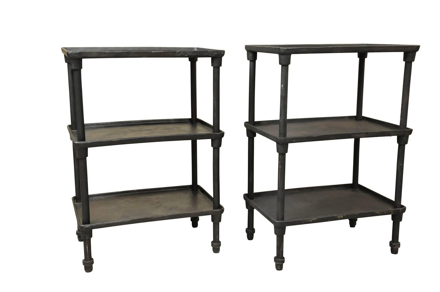 A very handsome pair of 19th century French Industrial side tables - end tables in substantial cast iron. Beautifully cast with a great finish. Wonderful as bedside tables - or in any living area.