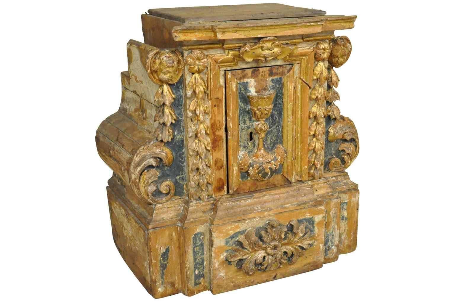 An exquisite 17th century Baroque tabernacle niche from Northern Italy. A stunning altarpiece constructed from polychromed and giltwood.