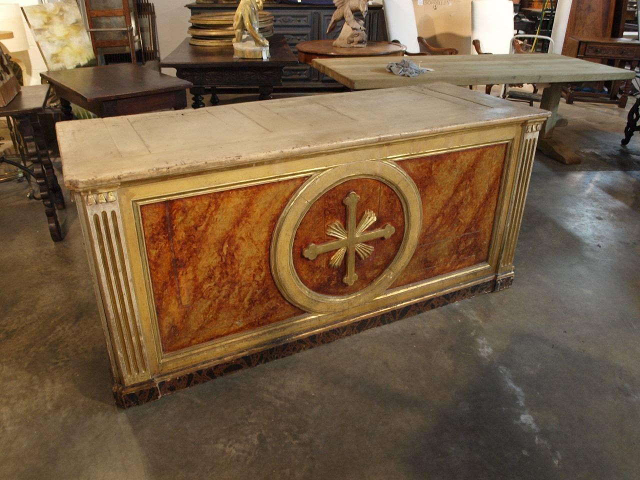 A stunning 18th century altar from Spain. Constructed from polychromed and giltwood with wonderful faux marble and water gilding detail. Fabulous as a counter or island.