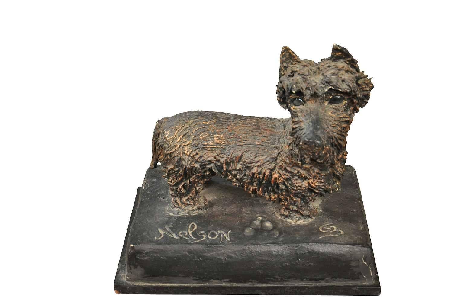 A delightful mid-20th century papier mâché statue of a Scottish Terrier named Nelson.