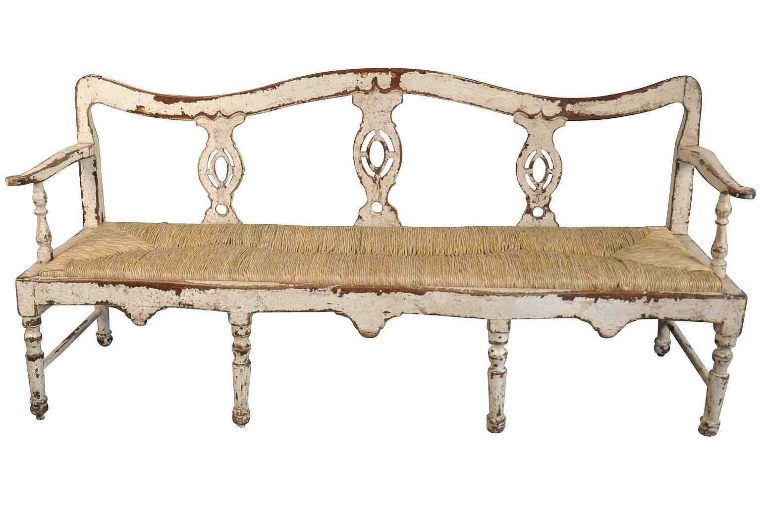 A charming 19th century banquette, bench from the Catalan region of Spain. Beautifully constructed in painted wood with rush seat.