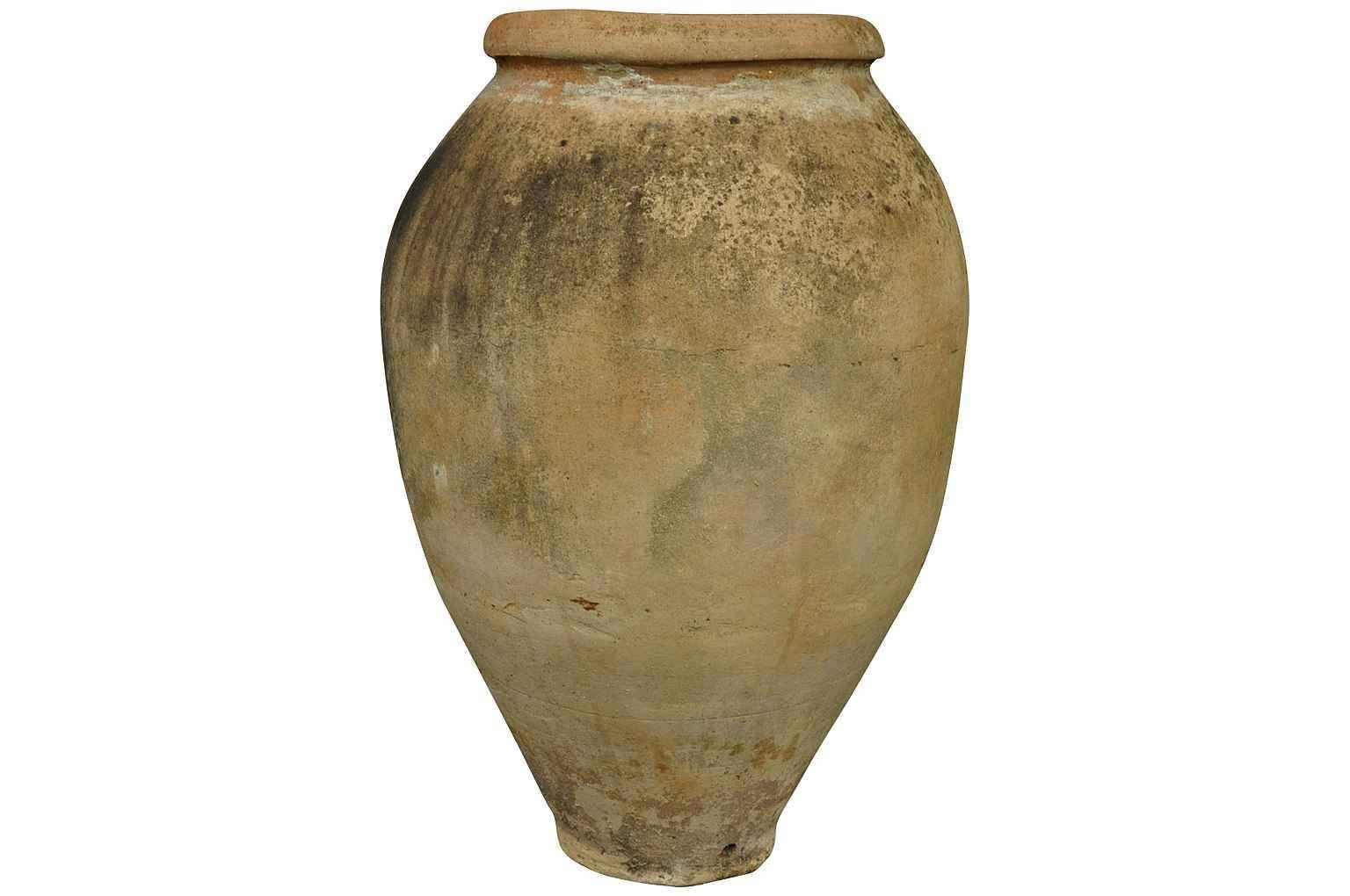 A 19th century terracotta jar from the Catalan region of Spain. Minimalist and beautiful lines. A lovely addition to any interior or garden.