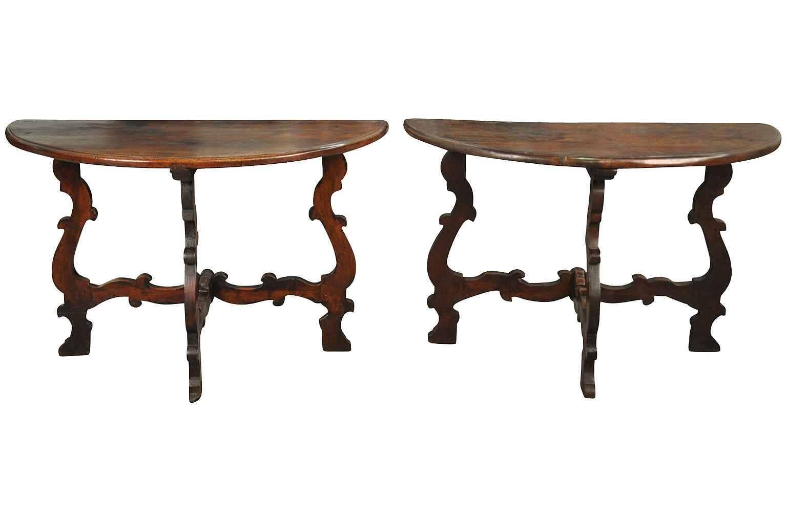 A very elegant and stunning pair of Northern Italian demilune tables in walnut. Wonderful patina and graining - rich and luminous. Classical Lyre leg construction. Wonderful as bedside tables.