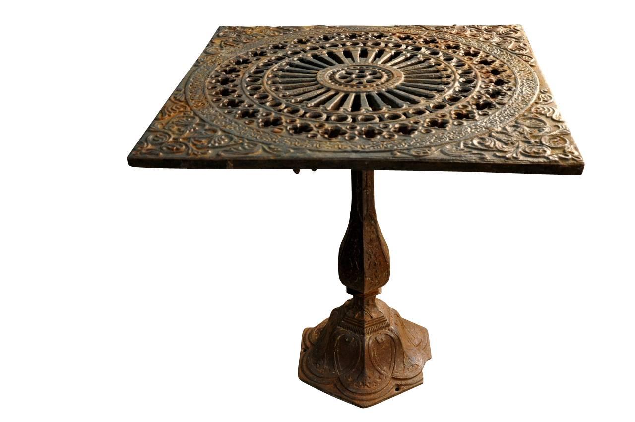 A charming Italian early 20th century cast iron garden table. A delightful accent piece for any garden or interior.