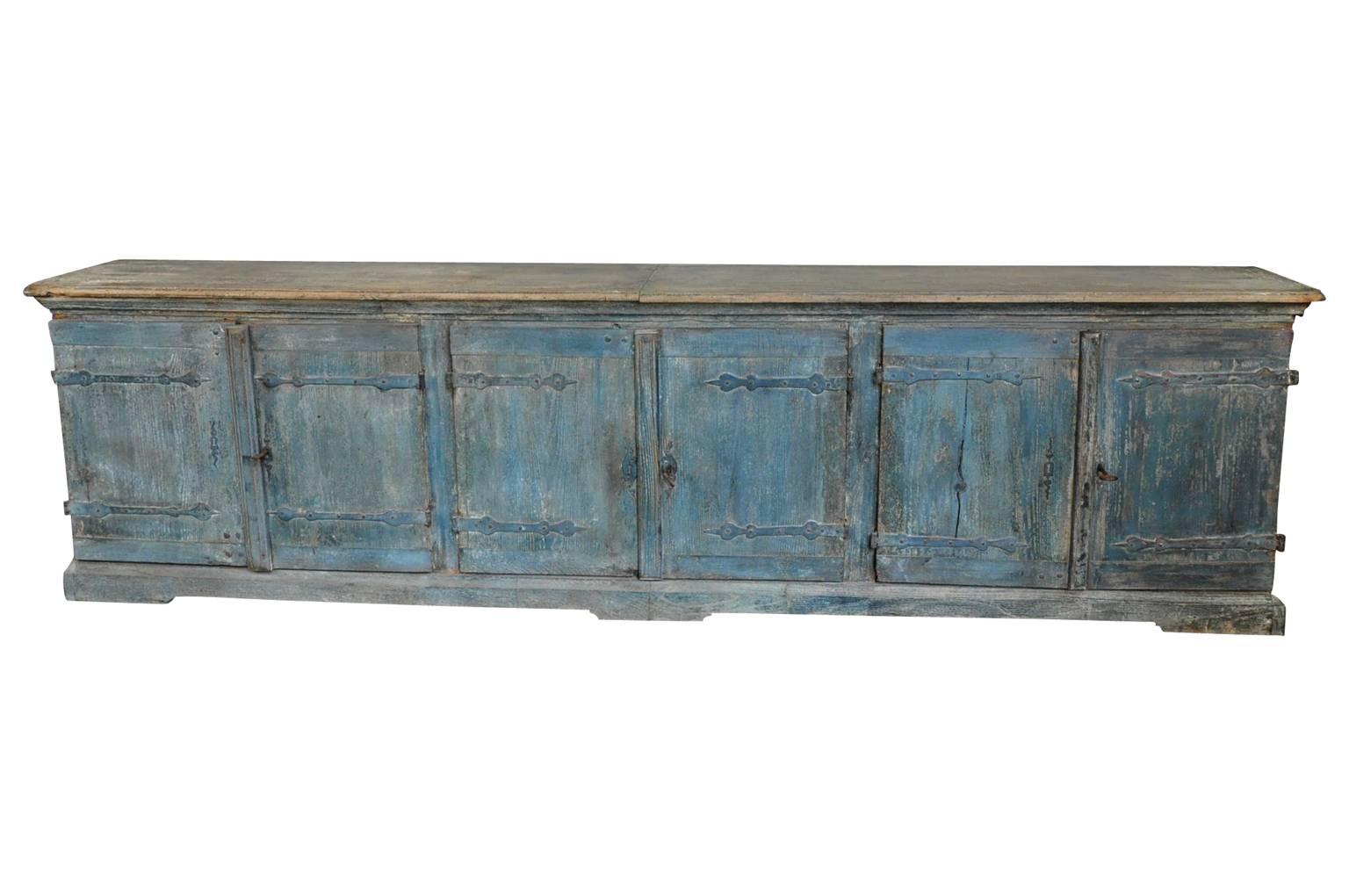 A monumental 18th century buffet, enfilade from the Catalan region of Spain. This tremendous storage piece has six doors with interior shelving. Fabulous painted finish.