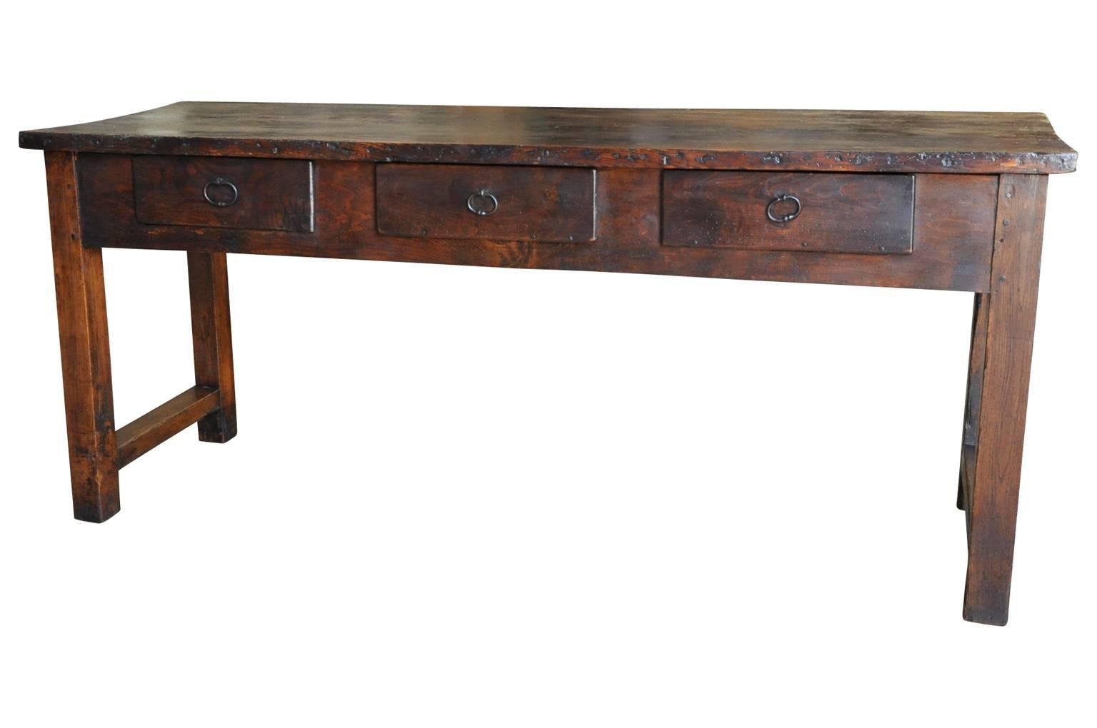 A very handsome French 18th century three-drawer console. This console has a wonderful Minimalist design and is soundly constructed in beech and pine woods. Also wonderful as a sofa table or sideboard.