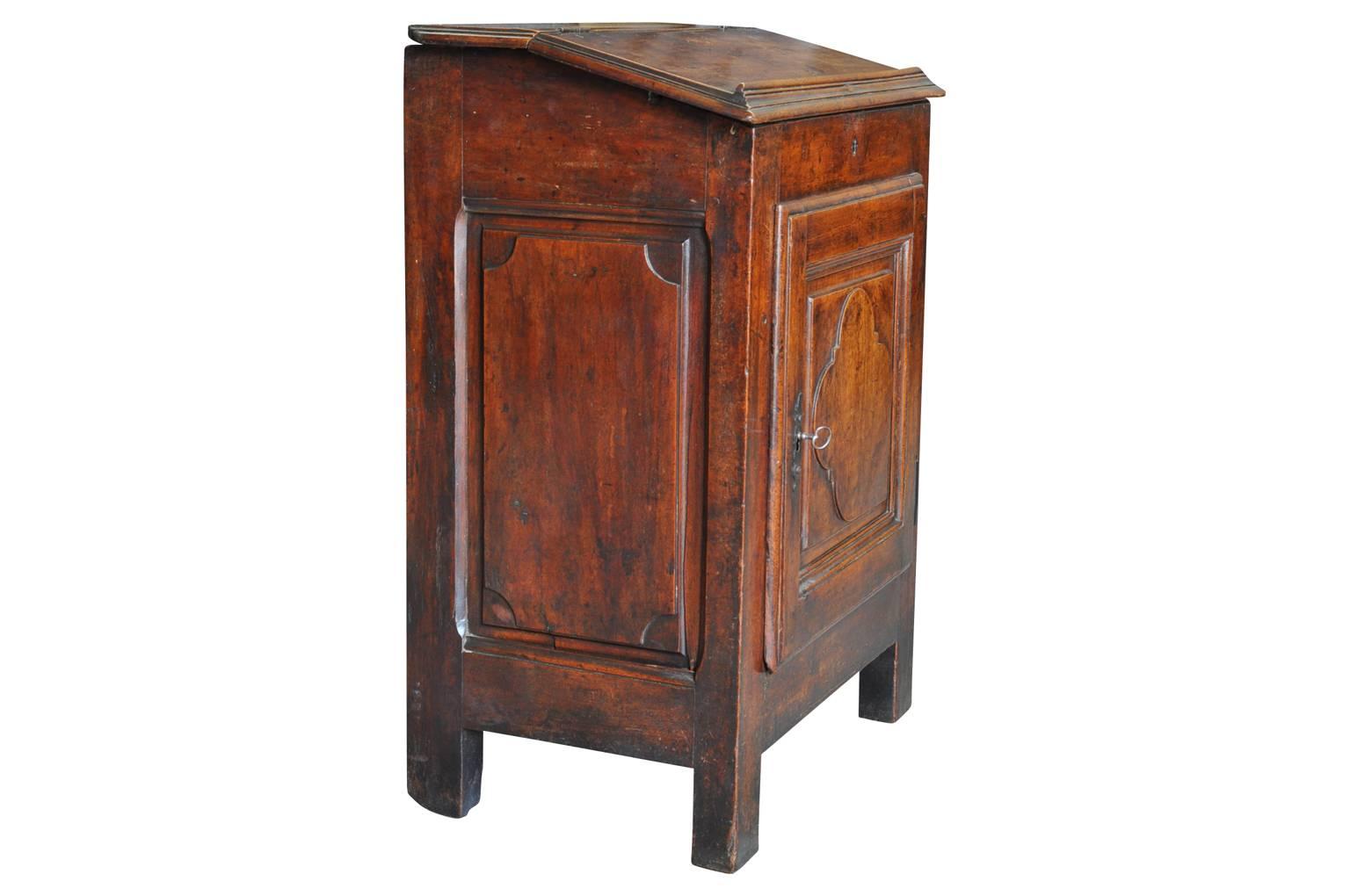 A charming French, 18th century Ecritoire side cabinet. Beautifully constructed from walnut. A wonderful accent piece for any living area.