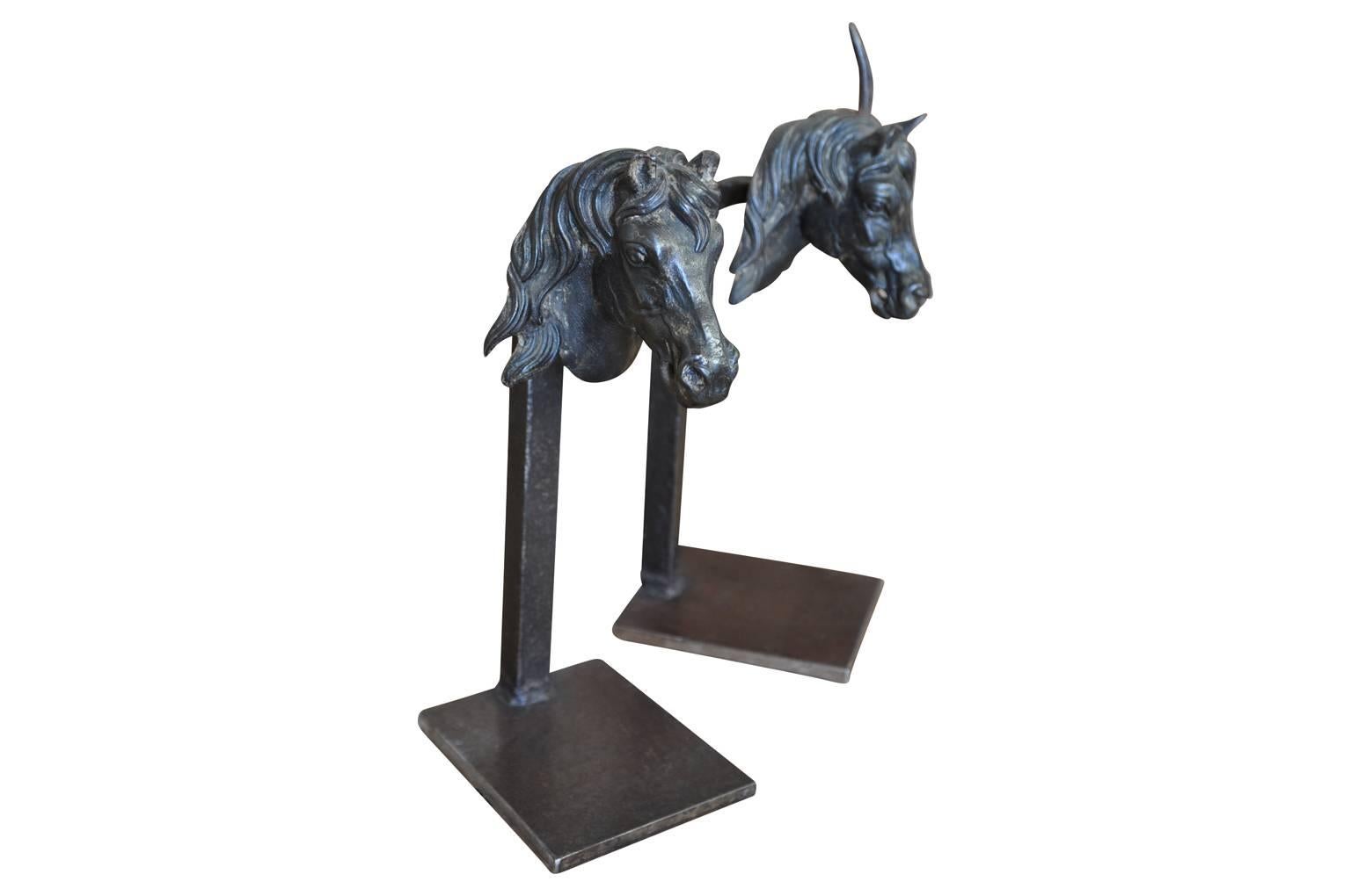 A very handsome pair of French early 19th century Serre-Livres or bookends. Crafted with beautifully casted Unicorn heads in iron. Later converted into bookends.